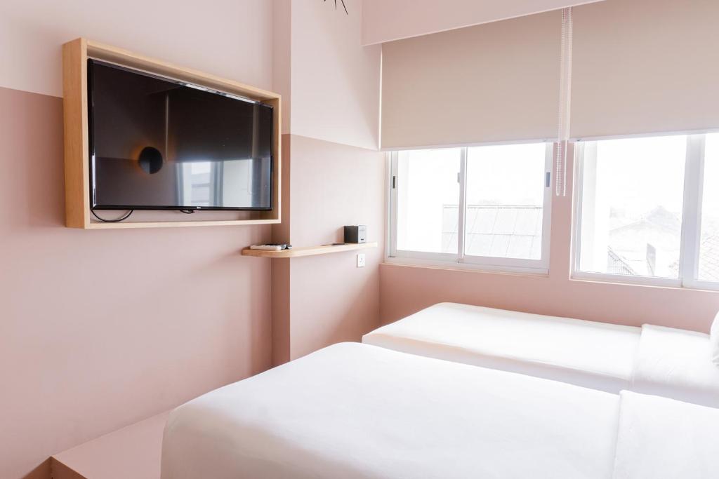 TV a/nebo společenská místnost v ubytování Kotta Hotel Semarang