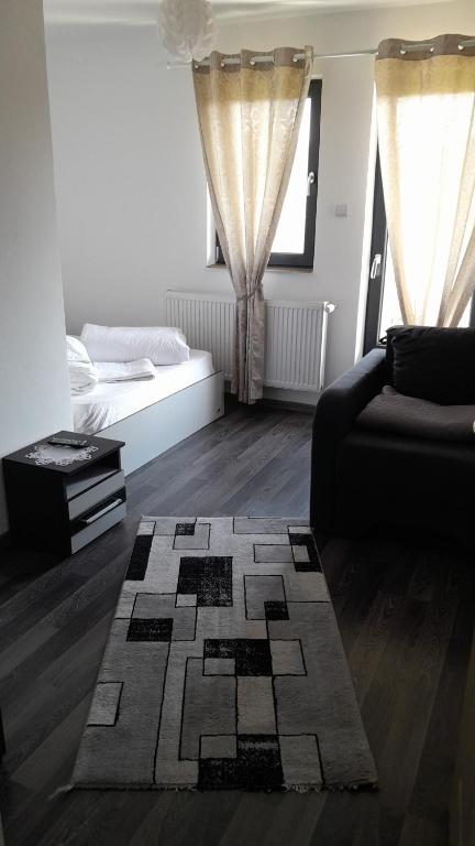 Voodi või voodid majutusasutuse Apartamente Ambrus E Studio 21 Praid toas