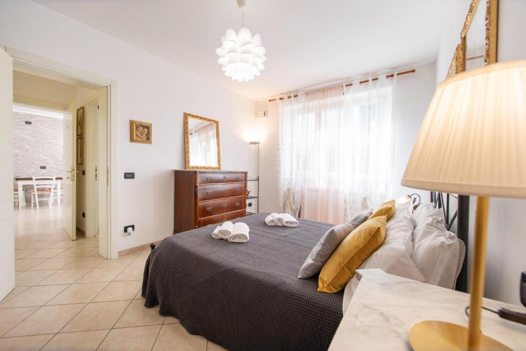 Posteľ alebo postele v izbe v ubytovaní Liala Home