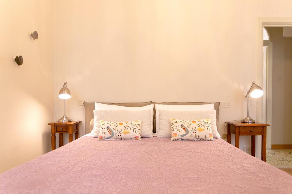 Łóżko lub łóżka w pokoju w obiekcie Casa delle Stelle Luxury