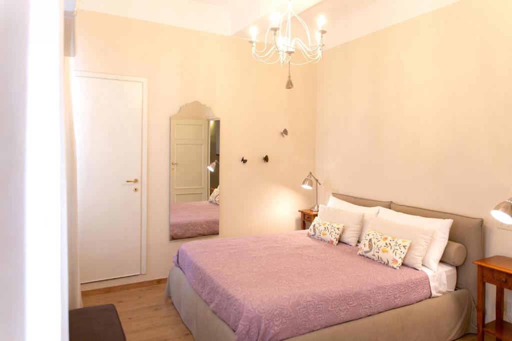 Łóżko lub łóżka w pokoju w obiekcie Casa delle Stelle Luxury