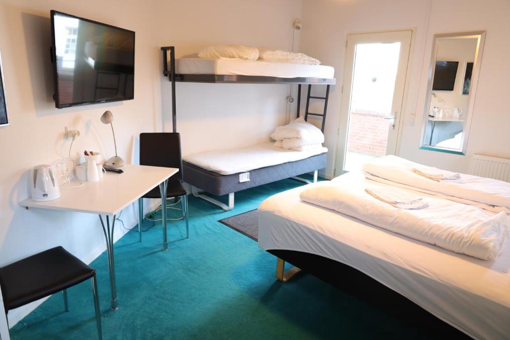 Postel nebo postele na pokoji v ubytování Motel Sindal