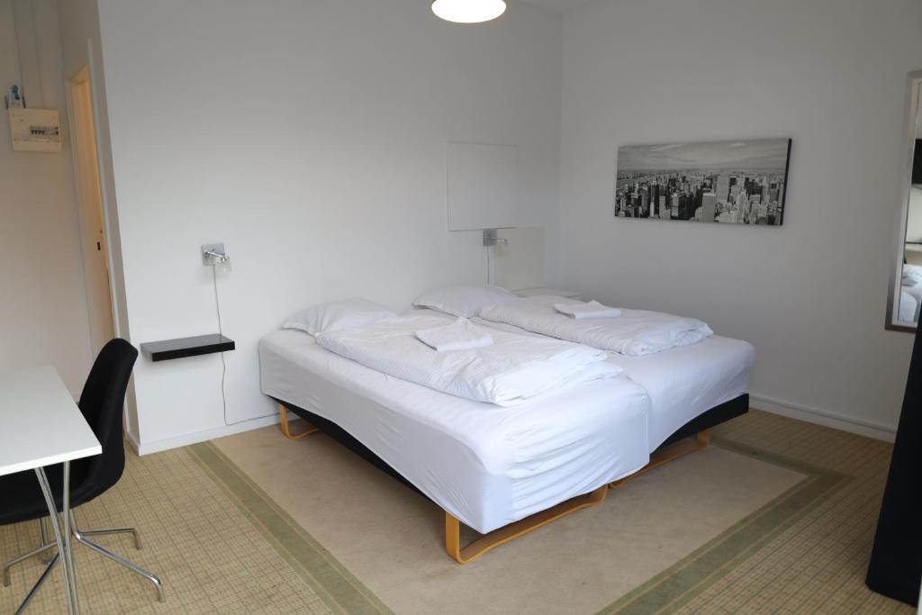 Postel nebo postele na pokoji v ubytování Motel Sindal