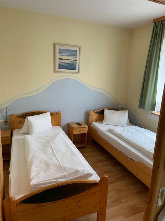 Postel nebo postele na pokoji v ubytování Waldrestaurant VIDA
