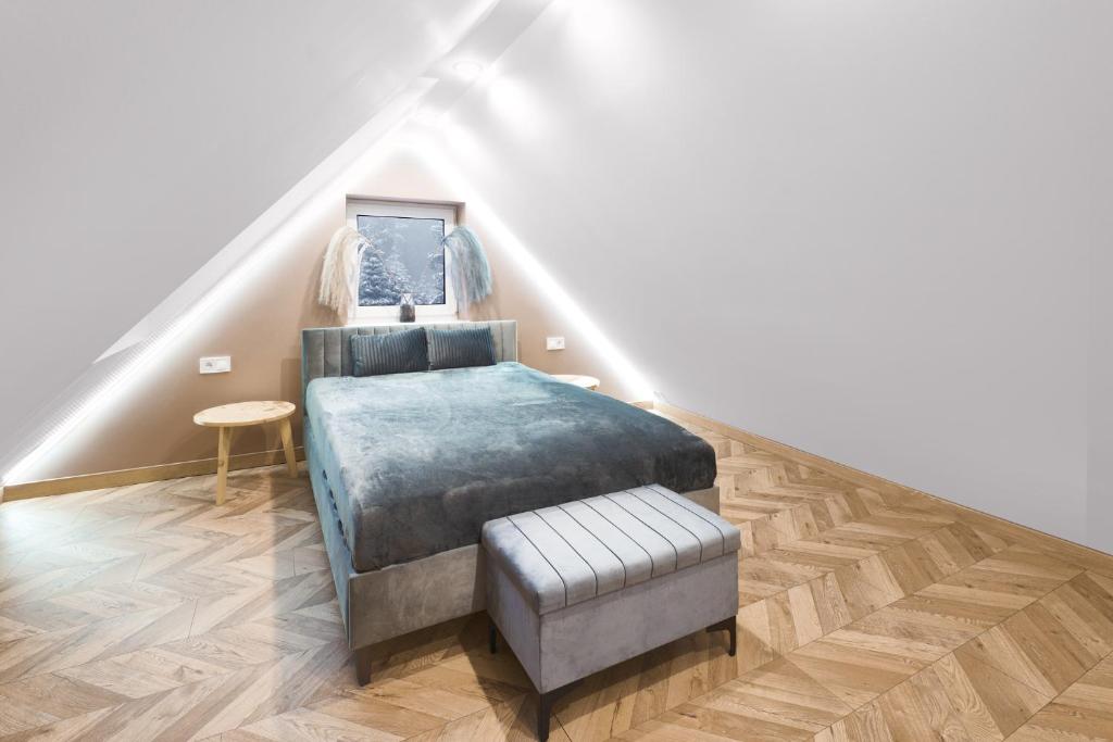 Posteľ alebo postele v izbe v ubytovaní Apartament z sauną i jacuzzi na wyłączność - Sikorówka - Dobre Miejsce