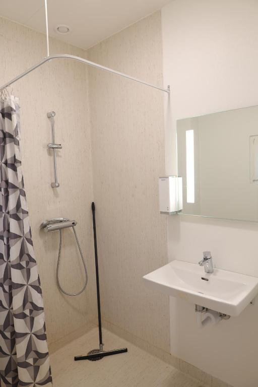 Koupelna v ubytování Motel Sindal