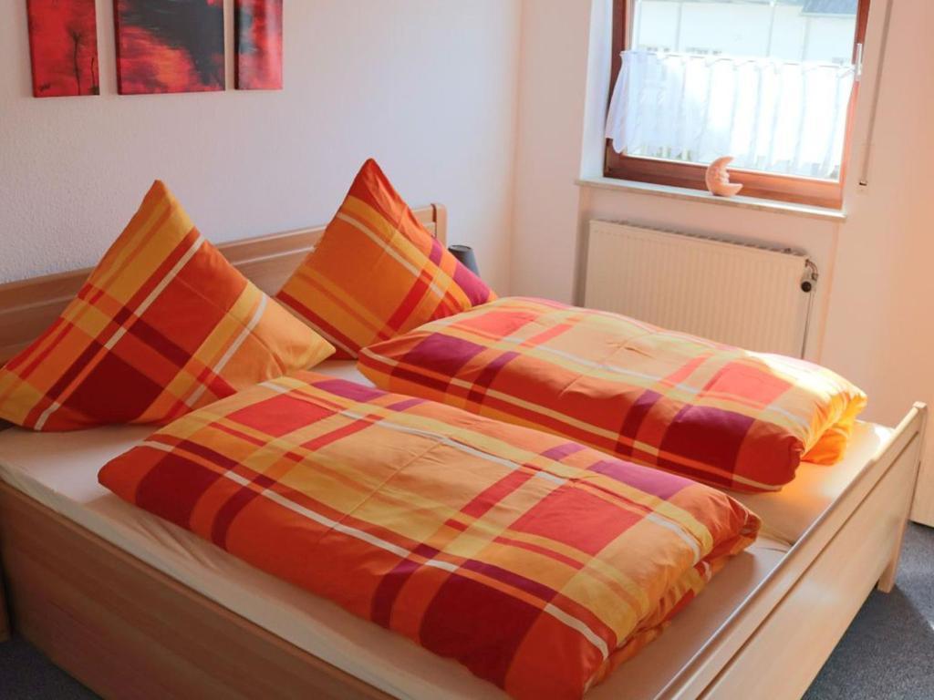 Postel nebo postele na pokoji v ubytování Zur Dorfschänke