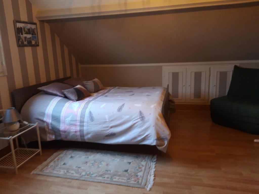 Postel nebo postele na pokoji v ubytování Les Puits Bessin Normandie