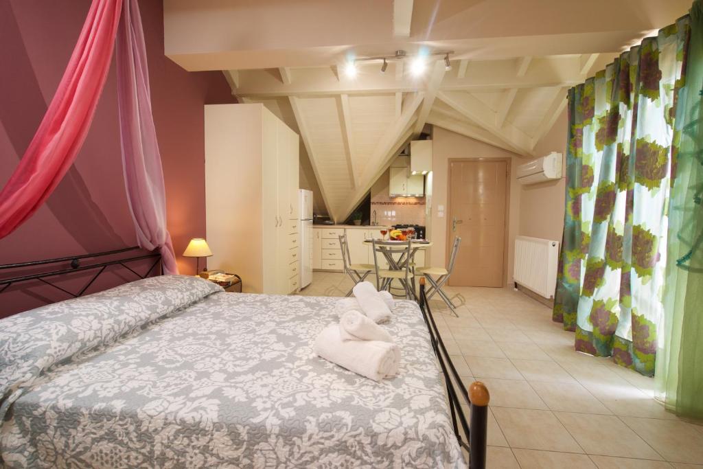 Posteľ alebo postele v izbe v ubytovaní City Suite in Kefalonia