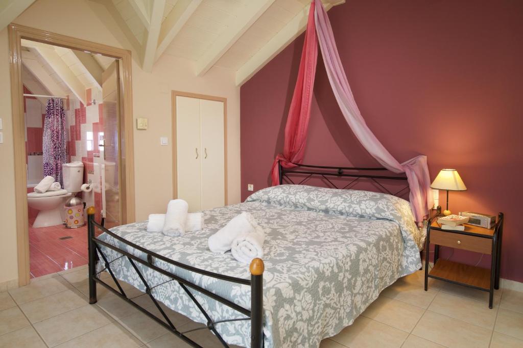 Posteľ alebo postele v izbe v ubytovaní City Suite in Kefalonia