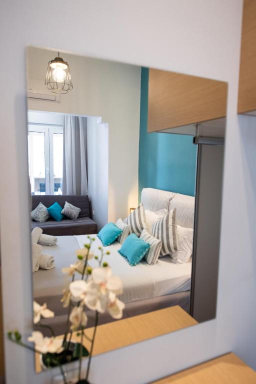 Posteľ alebo postele v izbe v ubytovaní LEFKAS CITY APARTMENTS & SUITES