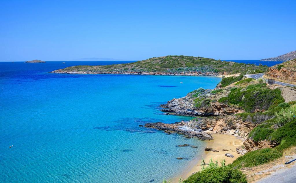 an aerial view of a beach with blue water at Hotel Perrakis in Kipri
