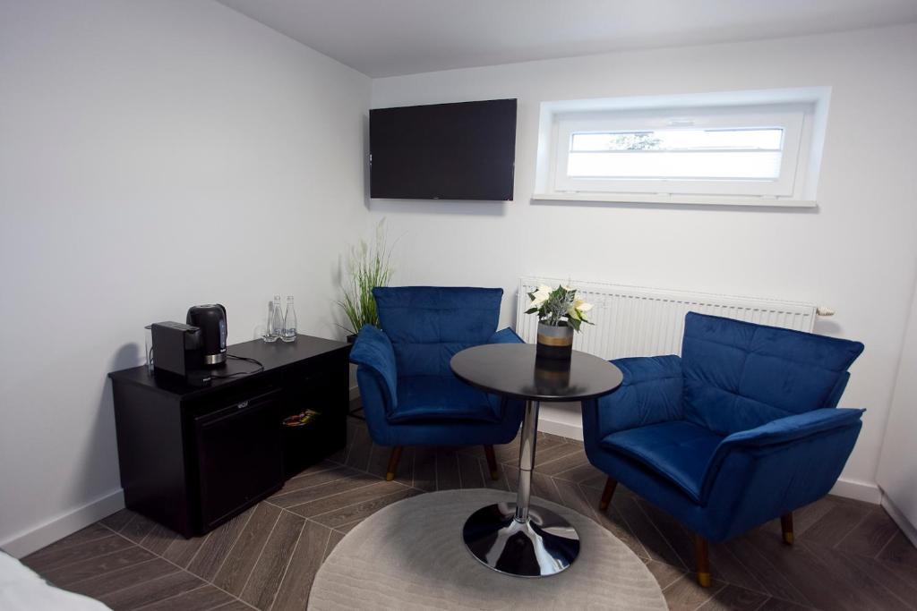 Televízia a/alebo spoločenská miestnosť v ubytovaní Willowa NO. 5 APARTAMENTS