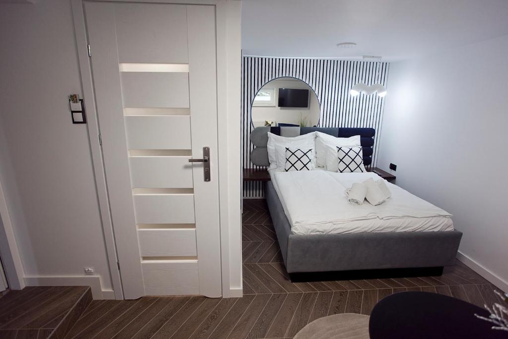 Posteľ alebo postele v izbe v ubytovaní Willowa NO. 5 APARTAMENTS