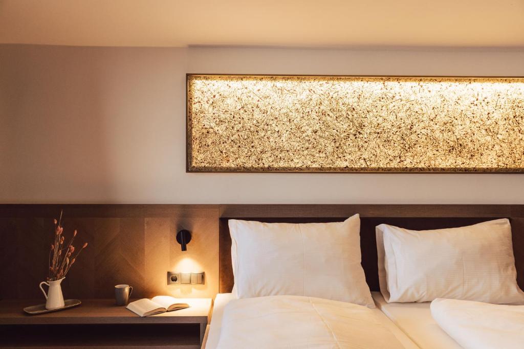 Postel nebo postele na pokoji v ubytování Hotel Lisl - Alpine Comfort