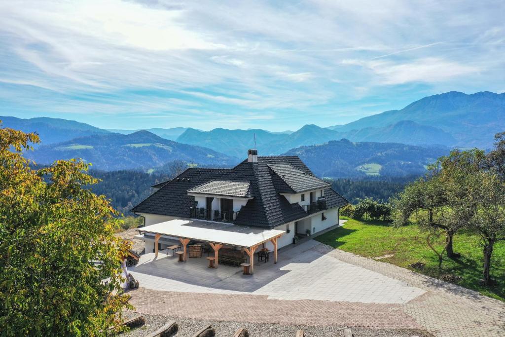 an aerial view of a house with a picnic table at Vila Marin in Prevalje
