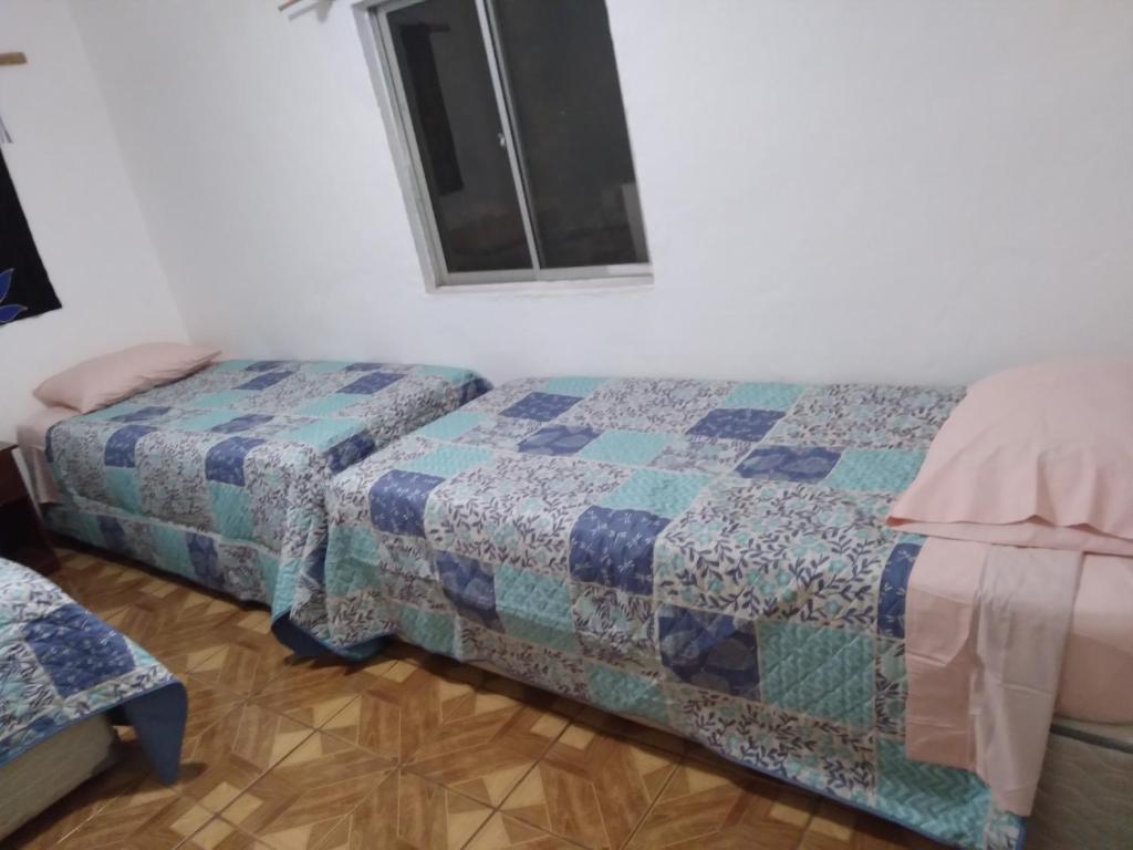 Postelja oz. postelje v sobi nastanitve Hare o Ahani