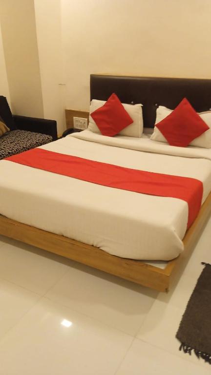 Postel nebo postele na pokoji v ubytování Hotel Maan Palace