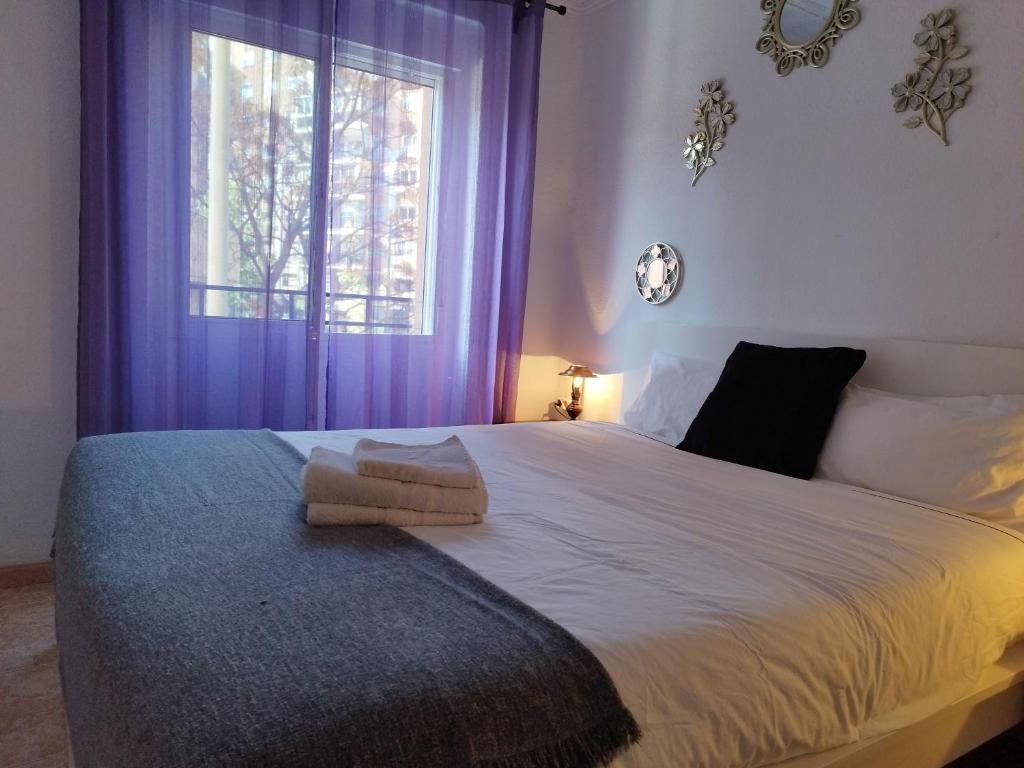 Postel nebo postele na pokoji v ubytování City apartment