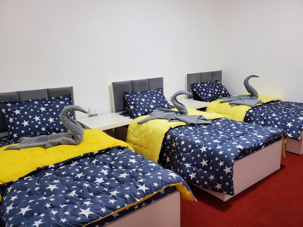 Postel nebo postele na pokoji v ubytování Petra Casablanca Hotel