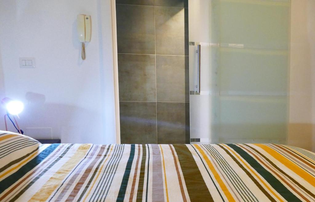 Postel nebo postele na pokoji v ubytování Tosti 79