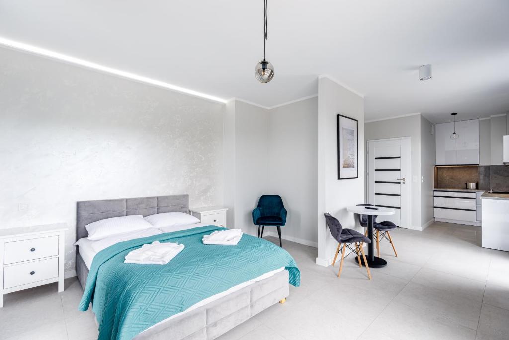 Postel nebo postele na pokoji v ubytování Balticus Apartamenty Standard Promenada Gwiazd 14