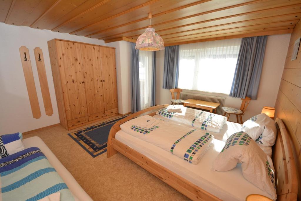 Postel nebo postele na pokoji v ubytování Haus Rudigier by Châtel Reizen