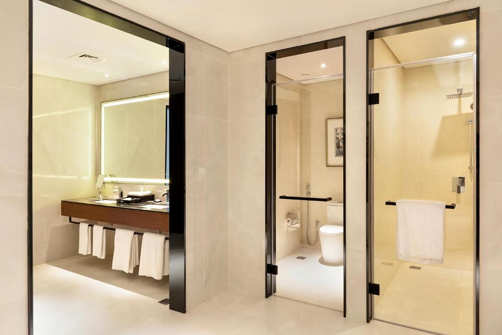 Koupelna v ubytování Asiana Grand Hotel