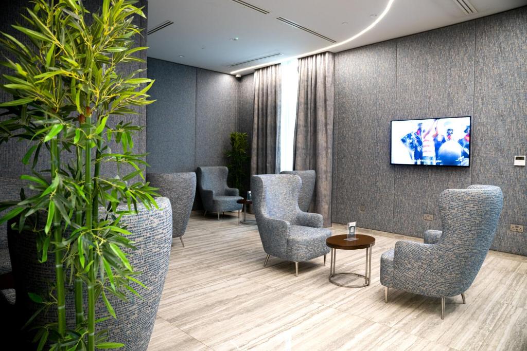 TV a/nebo společenská místnost v ubytování Jouri a Murwab hotel Doha