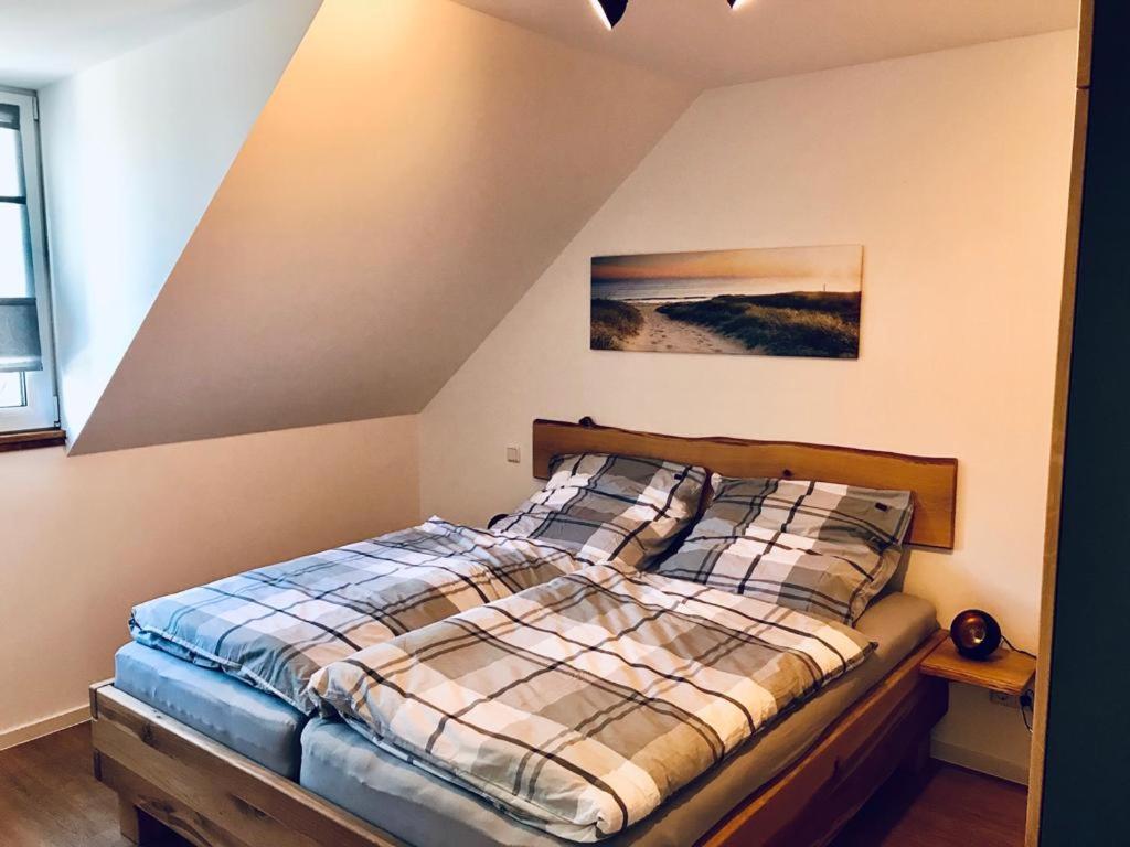 Postel nebo postele na pokoji v ubytování Ferienhaus Bug
