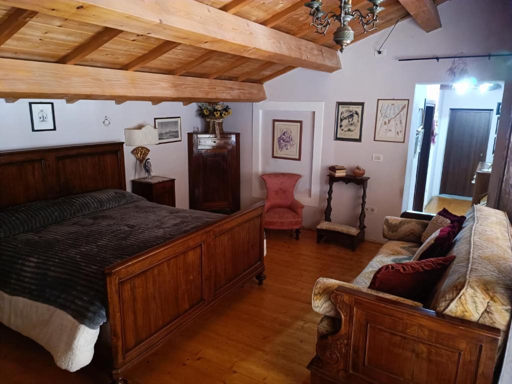 Postel nebo postele na pokoji v ubytování Alloggio Alla Collina