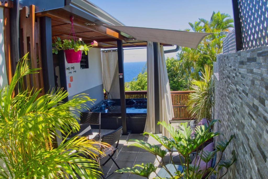 Zahrada ubytování Ka Hema - Maison entière avec Jacuzzi et vue sur mer