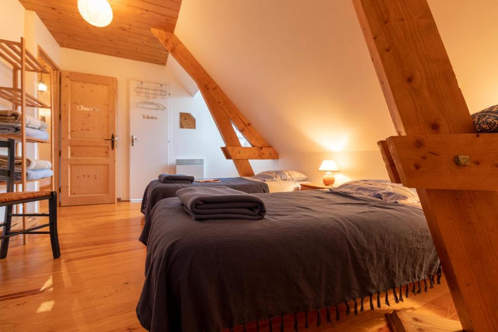 Postel nebo postele na pokoji v ubytování Chambres d'hôtes Le Gentil Home