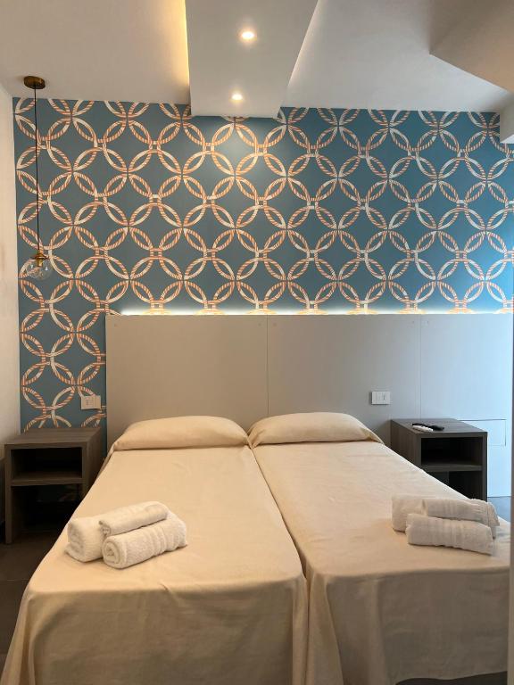 Posteľ alebo postele v izbe v ubytovaní Villa Serena vista mare