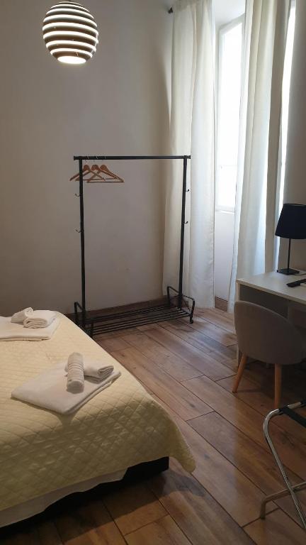 Postel nebo postele na pokoji v ubytování Albergo la Svolta