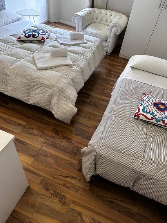 Postel nebo postele na pokoji v ubytování Albergo la Svolta