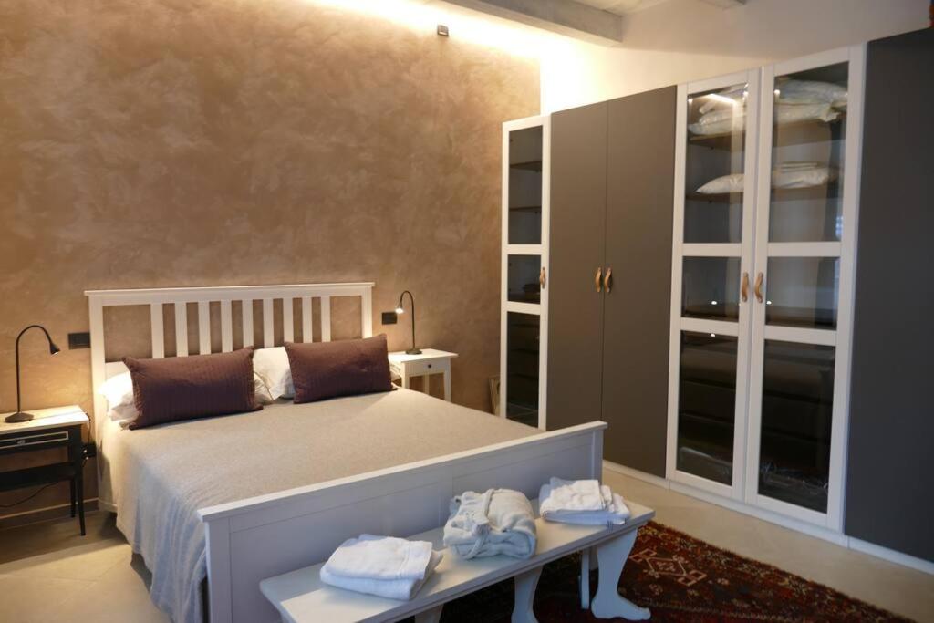 A bed or beds in a room at Naviglio Grande In Villa Milano