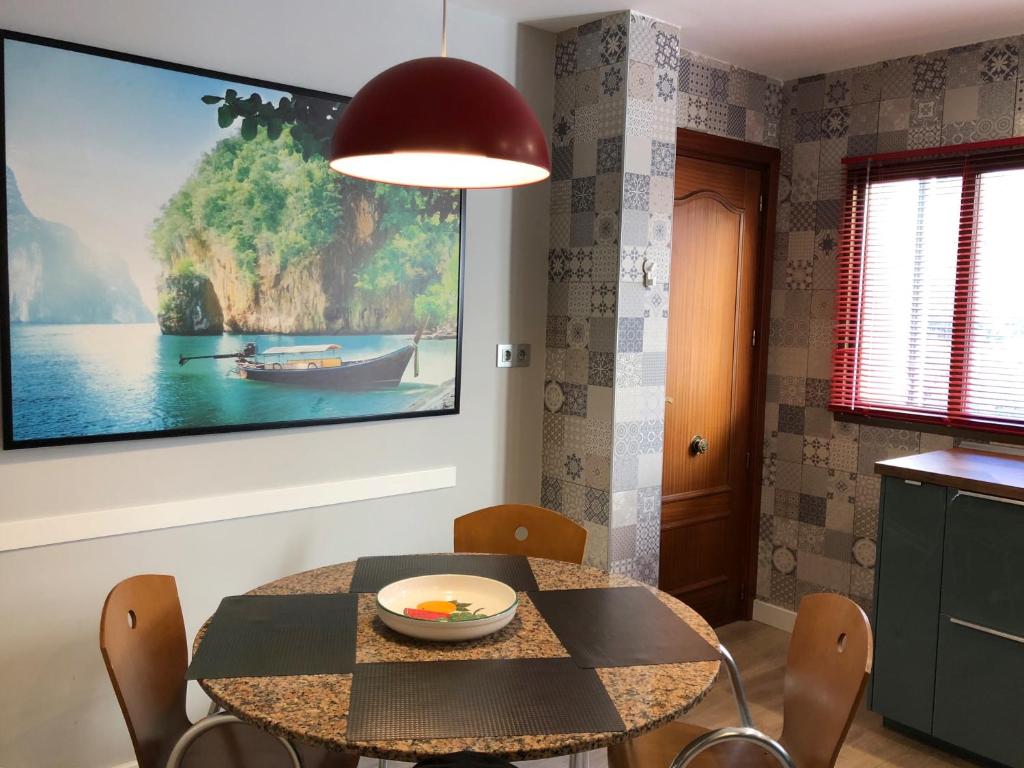 Posedenie v ubytovaní Apartment with Terrace and Sea View