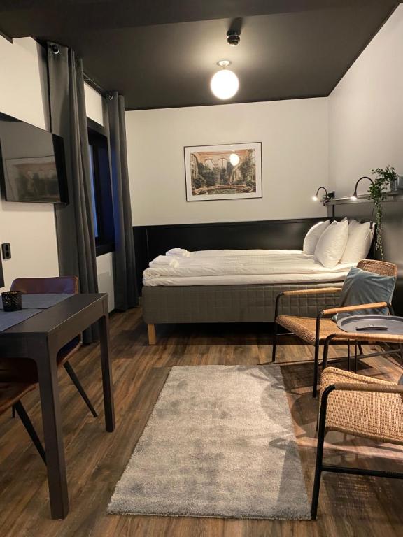 Postel nebo postele na pokoji v ubytování Magnolia House Sollentuna