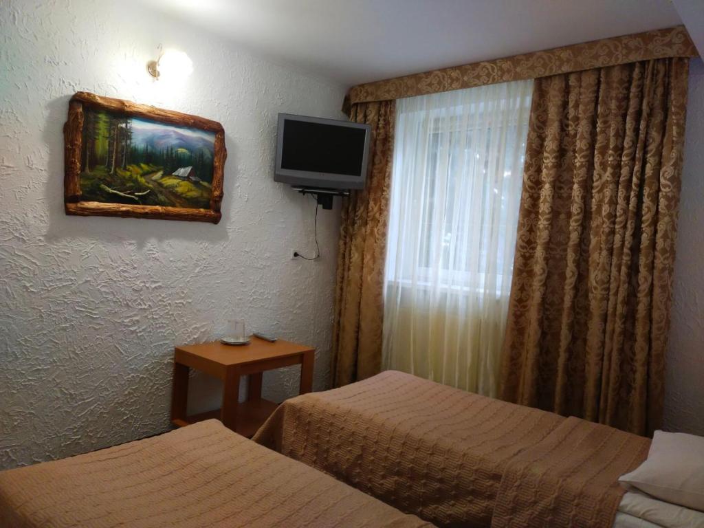Postel nebo postele na pokoji v ubytování Ra