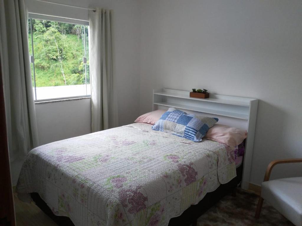 Voodi või voodid majutusasutuse QUARTO CASA FREDERICO toas