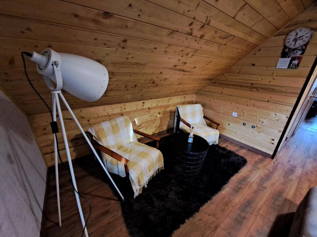 Posezení v ubytování Holiday Home "Sleme" with jacuzzi, big garden and arbor with fireplace