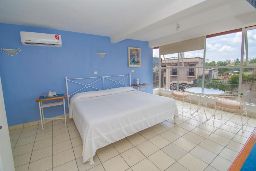 Postel nebo postele na pokoji v ubytování Balcon del Alferez