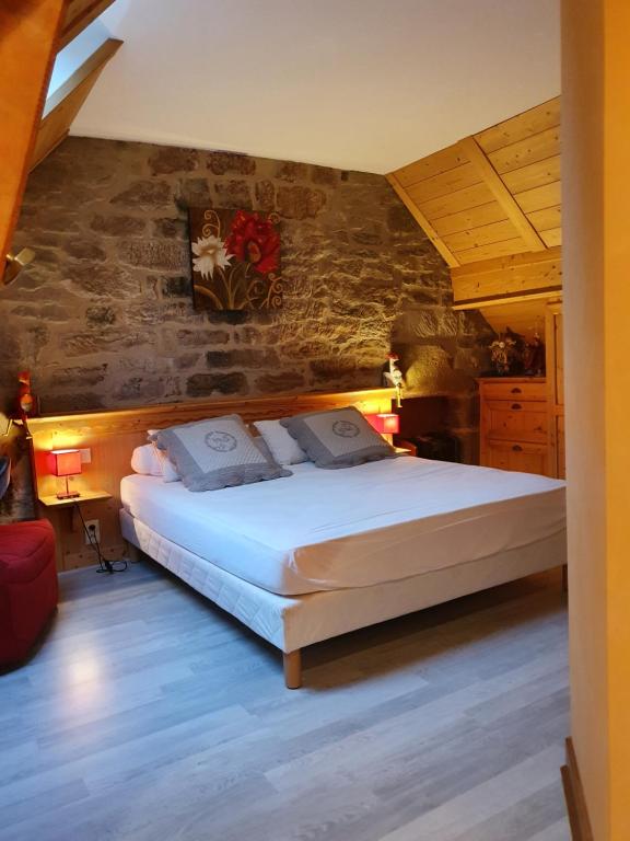 Postel nebo postele na pokoji v ubytování Le Pigeonnier de Lissac