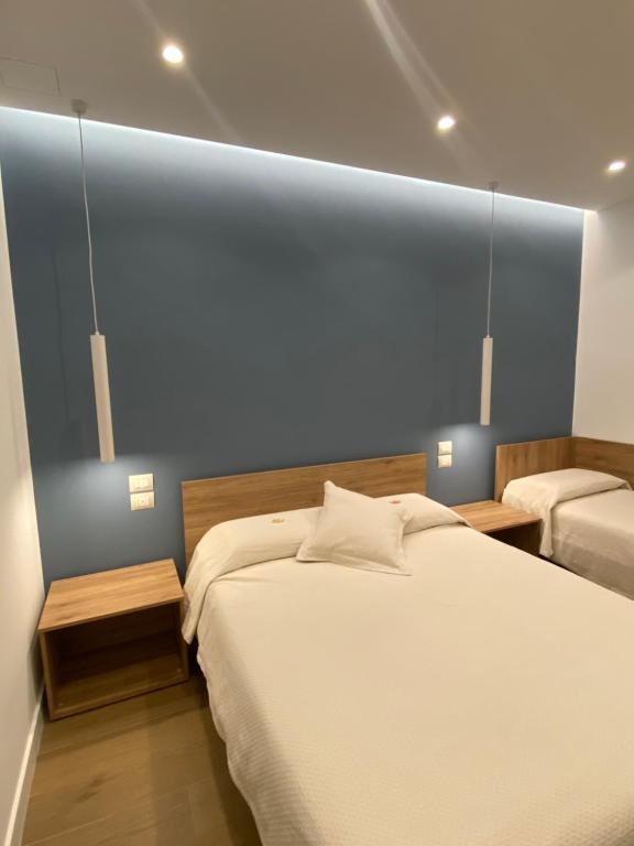 Postel nebo postele na pokoji v ubytování B&B MoMi Sorrento