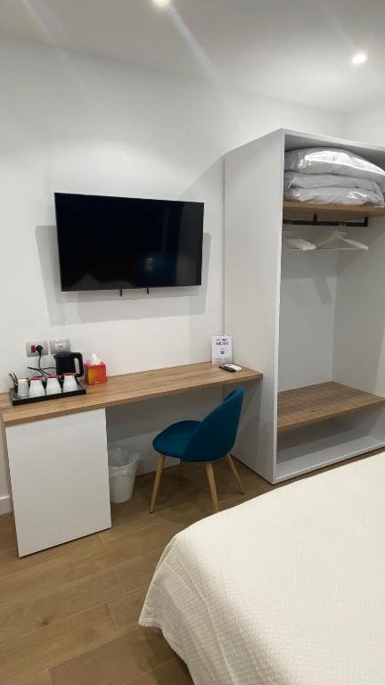Postel nebo postele na pokoji v ubytování B&B MoMi Sorrento