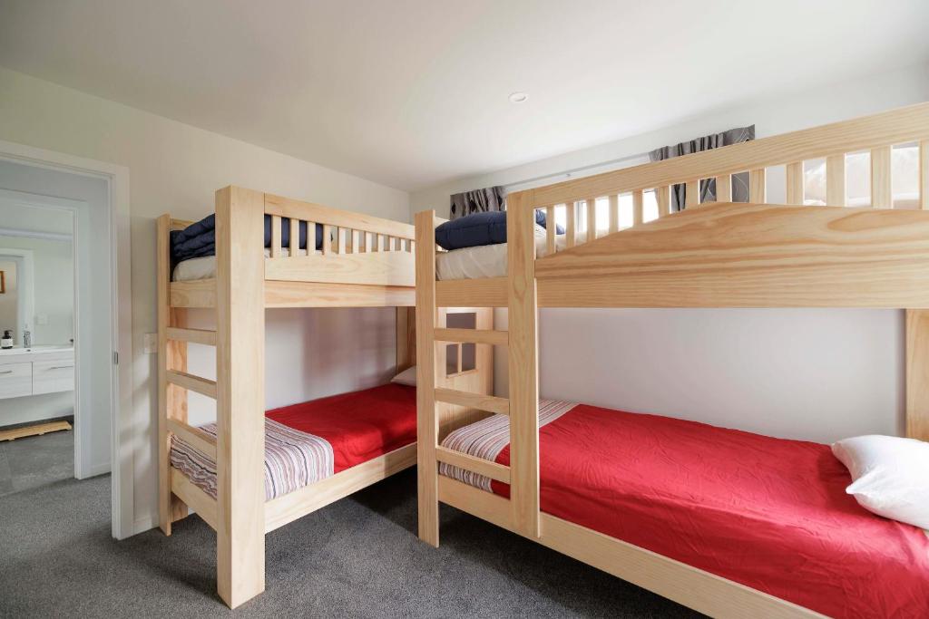 Postel nebo postele na pokoji v ubytování Luxury in Kaiteriteri
