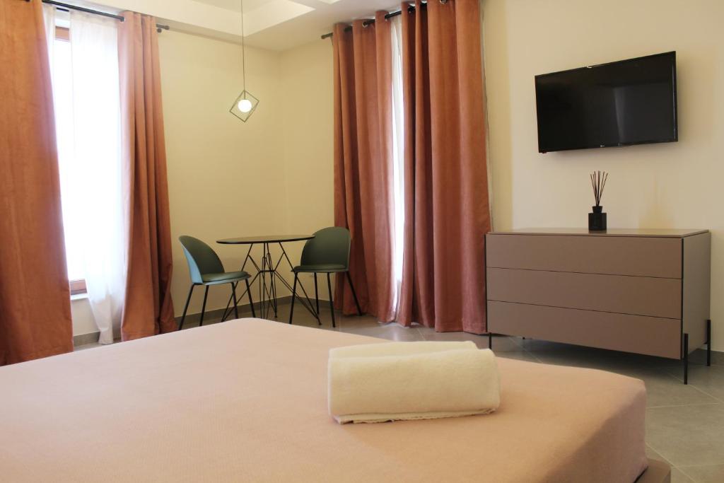 TV a/nebo společenská místnost v ubytování Margiò House