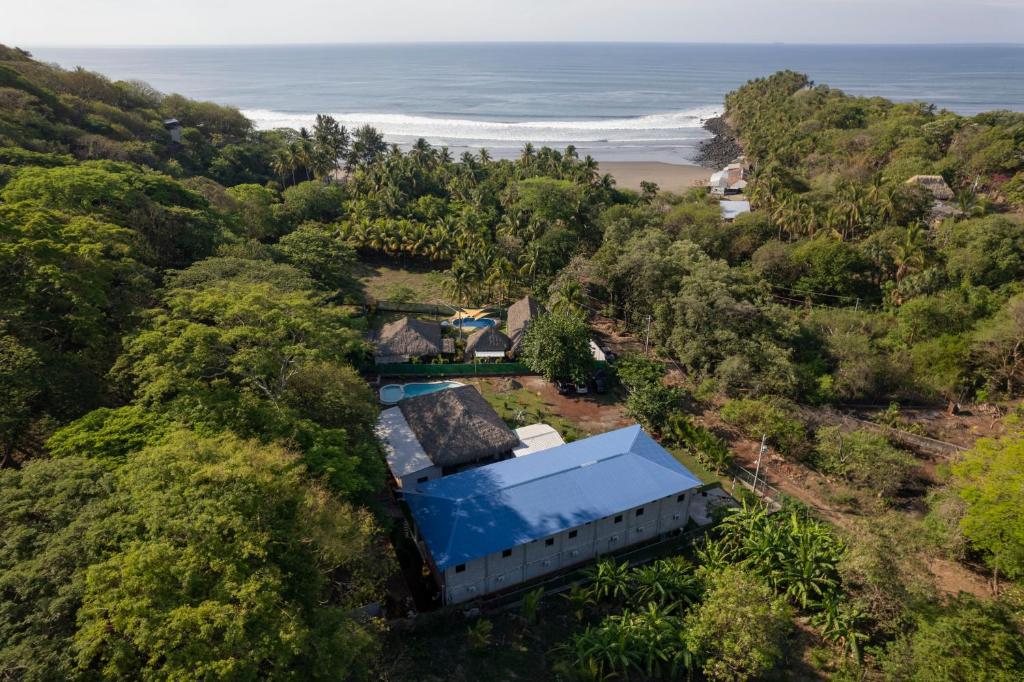 an aerial view of a house with the ocean in the background at RodMar Hotel in El Cuco