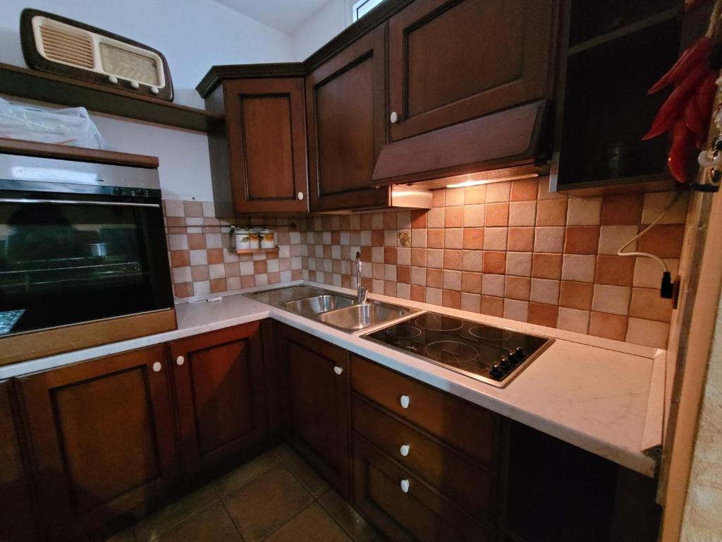 Kuchyň nebo kuchyňský kout v ubytování Dimora2 MGM